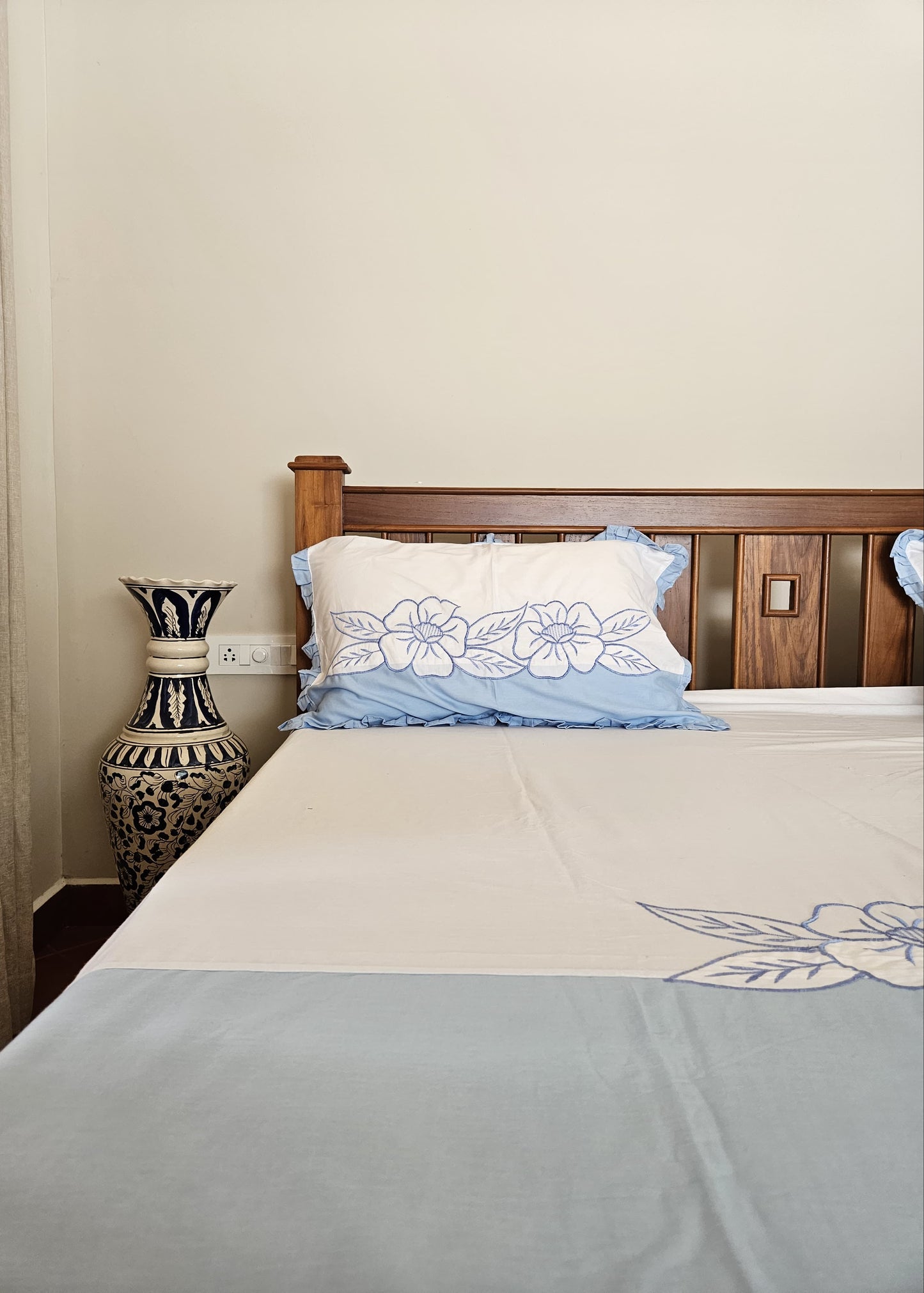 Embroidery applique work sheet with frilled pillow covers